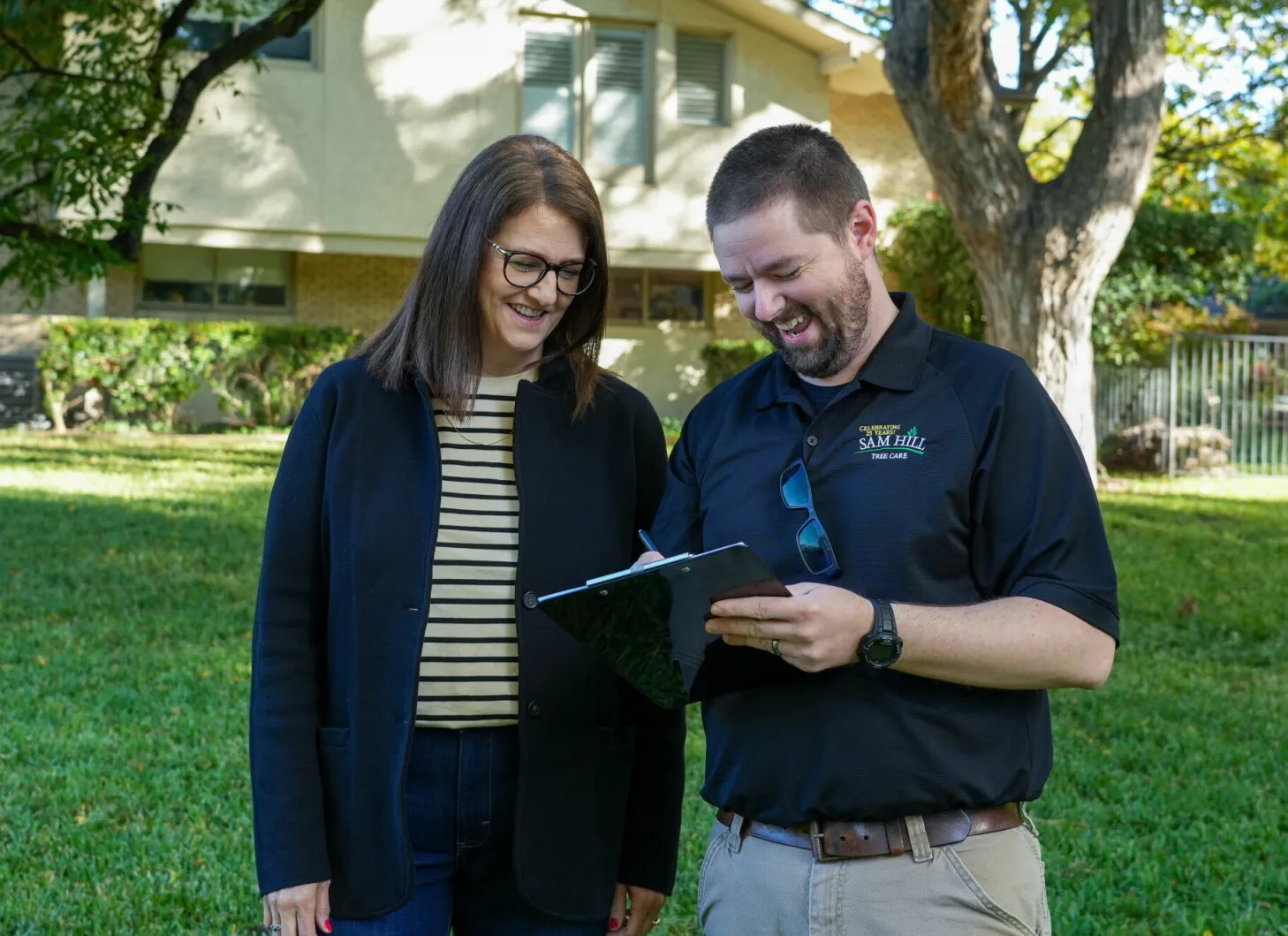 Sam Hill Tree Care Arborist with client